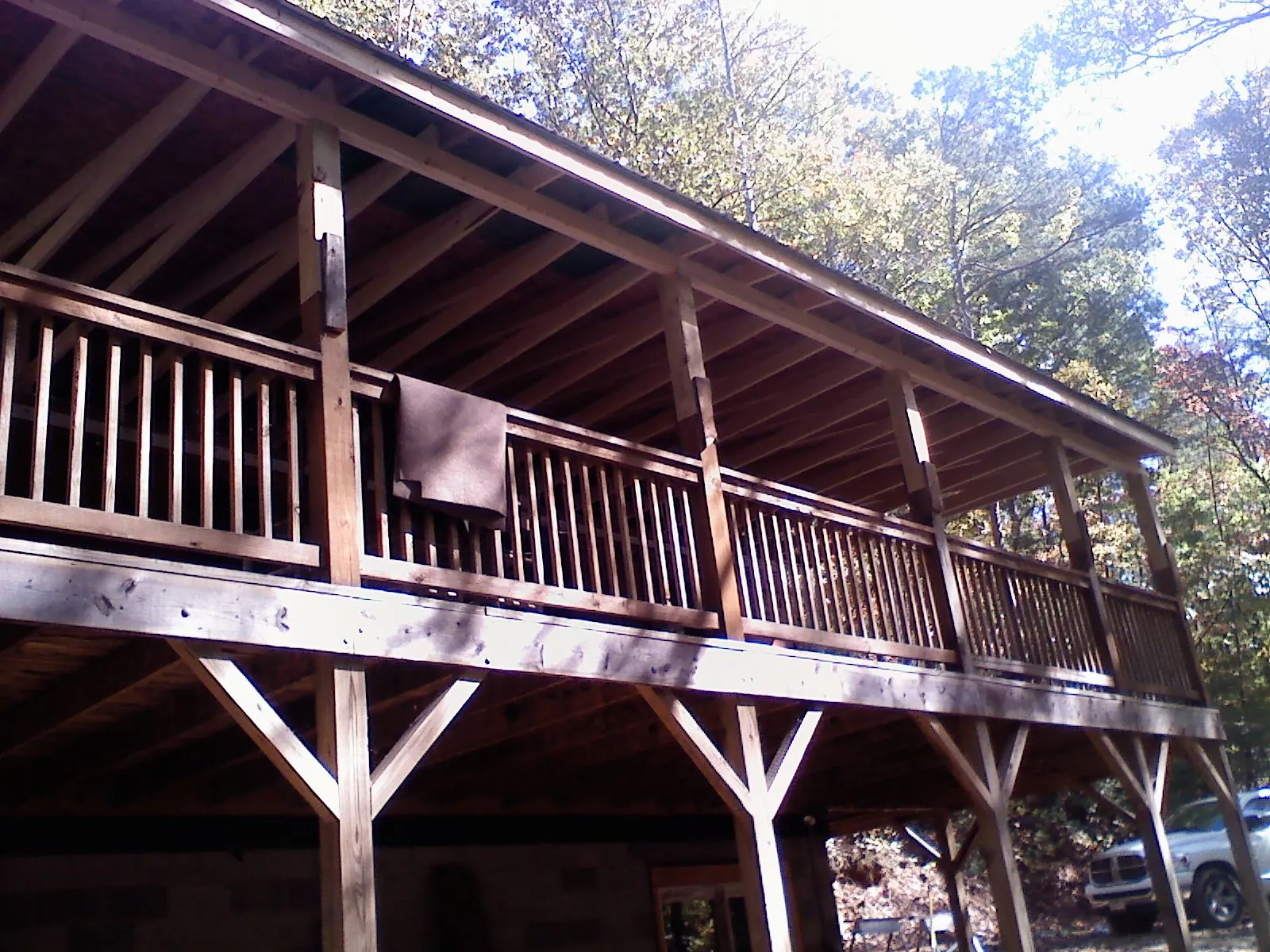 Timber framing under a new elevated porch and deck — Roof Leak Repair in Hollansburg by Roofing Brothers